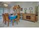 Dining room with wooden table, chairs, and built-in hutch at 2798 Rock Creek Dr, Port Charlotte, FL 33948