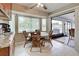 Kitchen nook with table and chairs, view to backyard at 2798 Rock Creek Dr, Port Charlotte, FL 33948