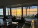 Living room with stunning sunset views and waterfront access at 311 Bayridge Pl, Punta Gorda, FL 33950