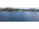 Kayakers paddle in front of waterfront hotels and a palm tree-lined shore at 311 Bayridge Pl, Punta Gorda, FL 33950