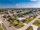 Aerial view showcasing a single-story house near the water at 3200 Colony Ct, Punta Gorda, FL 33950