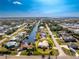 Aerial view showing a single Gathering home and surrounding canal at 3200 Colony Ct, Punta Gorda, FL 33950