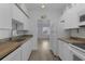 Bright kitchen with butcher block countertops and white cabinets at 3740 Easy St, Port Charlotte, FL 33952