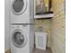 Laundry room with stackable washer and dryer at 3740 Easy St, Port Charlotte, FL 33952