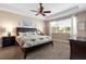 Comfortable main bedroom with ceiling fan and ample natural light at 3959 San Rocco Dr # 312, Punta Gorda, FL 33950