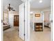 Hallway view of laundry, bedroom, and living spaces at 3959 San Rocco Dr # 312, Punta Gorda, FL 33950