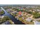 Aerial view showing home's location on a canal with neighborhood context at 4122 Library St, Port Charlotte, FL 33948