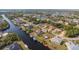 Wide shot of neighborhood with canal and many houses at 4122 Library St, Port Charlotte, FL 33948