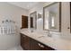 Bathroom with double vanity and granite countertops at 4122 Library St, Port Charlotte, FL 33948