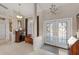 Bright entryway with double doors and tiled floors at 4122 Library St, Port Charlotte, FL 33948