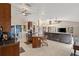 Kitchen with island, stainless steel appliances, and dark wood cabinets at 4122 Library St, Port Charlotte, FL 33948