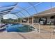 Spacious pool and patio with screened enclosure at 4122 Library St, Port Charlotte, FL 33948