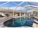 Inviting screened pool and patio area at 4122 Library St, Port Charlotte, FL 33948