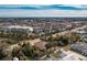 Aerial view of a house situated near a community lake at 437 Loveland Blvd, Port Charlotte, FL 33954