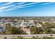 Aerial view of a house and surrounding neighborhood at 437 Loveland Blvd, Port Charlotte, FL 33954