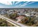 Aerial view of a house, highlighting its size and curb appeal at 437 Loveland Blvd, Port Charlotte, FL 33954