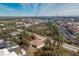 An aerial view of a house and the surrounding landscape at 437 Loveland Blvd, Port Charlotte, FL 33954