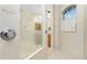 Walk in shower with frosted glass partition at 437 Loveland Blvd, Port Charlotte, FL 33954