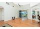 Bright and airy living room with high ceilings and hardwood floors at 437 Loveland Blvd, Port Charlotte, FL 33954