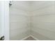 Walk-in pantry with wire shelving for ample storage at 437 Loveland Blvd, Port Charlotte, FL 33954