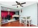 Dining area with table and chairs, leading to a music room at 4657 Nele St, North Port, FL 34287