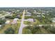 Property view showing surrounding houses and landscape at 5435 Montego Ln, Port Charlotte, FL 33981