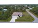 One-story house with a driveway and grassy yard at 5435 Montego Ln, Port Charlotte, FL 33981