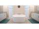 Bathroom with soaking tub and double vanity at 5435 Montego Ln, Port Charlotte, FL 33981