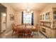 Charming dining room with wood table and hutch at 5435 Montego Ln, Port Charlotte, FL 33981