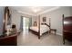 Spacious main bedroom with king-size bed and private access to pool at 5435 Montego Ln, Port Charlotte, FL 33981