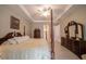 Elegant main bedroom with a king-size bed and ensuite bathroom at 5435 Montego Ln, Port Charlotte, FL 33981