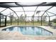 Inviting screened-in pool with ample deck space at 5435 Montego Ln, Port Charlotte, FL 33981