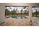 Relaxing screened-in pool and patio area with lounge chairs at 5435 Montego Ln, Port Charlotte, FL 33981