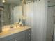 Clean bathroom with a vanity and shower at 5448 Joy Ct, North Port, FL 34287