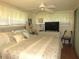 Spacious main bedroom with a king-size bed and TV at 5448 Joy Ct, North Port, FL 34287