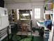 Well-equipped workshop with workbench and storage at 5448 Joy Ct, North Port, FL 34287