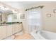 Relaxing bathroom with double vanity, soaking tub, and shower at 5465 Trumpet St, North Port, FL 34291