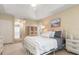 Serene bedroom with access to the bathroom and closet at 5465 Trumpet St, North Port, FL 34291