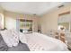 Main bedroom with private access to the pool area at 5465 Trumpet St, North Port, FL 34291