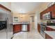 Modern kitchen featuring stainless steel appliances and ample counter space at 5465 Trumpet St, North Port, FL 34291