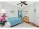 Small bedroom with a full bed and ceiling fan at 594 Rotonda Cir, Rotonda West, FL 33947