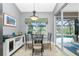 Casual breakfast nook with view of the pool at 594 Rotonda Cir, Rotonda West, FL 33947