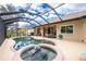 Enjoy this large pool and spa with screened enclosure at 594 Rotonda Cir, Rotonda West, FL 33947