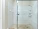 Clean shower with glass enclosure and multiple shower heads at 594 Rotonda Cir, Rotonda West, FL 33947