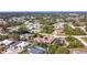 Aerial view of residential neighborhood, showcasing homes and landscape at 7148 & 7140 Coventry Ter, Englewood, FL 34224