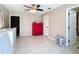 Bedroom with red cabinet and access to bathroom at 7148 & 7140 Coventry Ter, Englewood, FL 34224