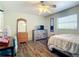 Bedroom with a full-size bed and dresser at 7148 & 7140 Coventry Ter, Englewood, FL 34224