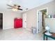 Bedroom with red cabinet and access to bathroom at 7148 & 7140 Coventry Ter, Englewood, FL 34224