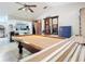 Game room with pool table and open space at 7148 & 7140 Coventry Ter, Englewood, FL 34224