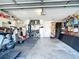 Garage with storage and exercise equipment at 7148 & 7140 Coventry Ter, Englewood, FL 34224